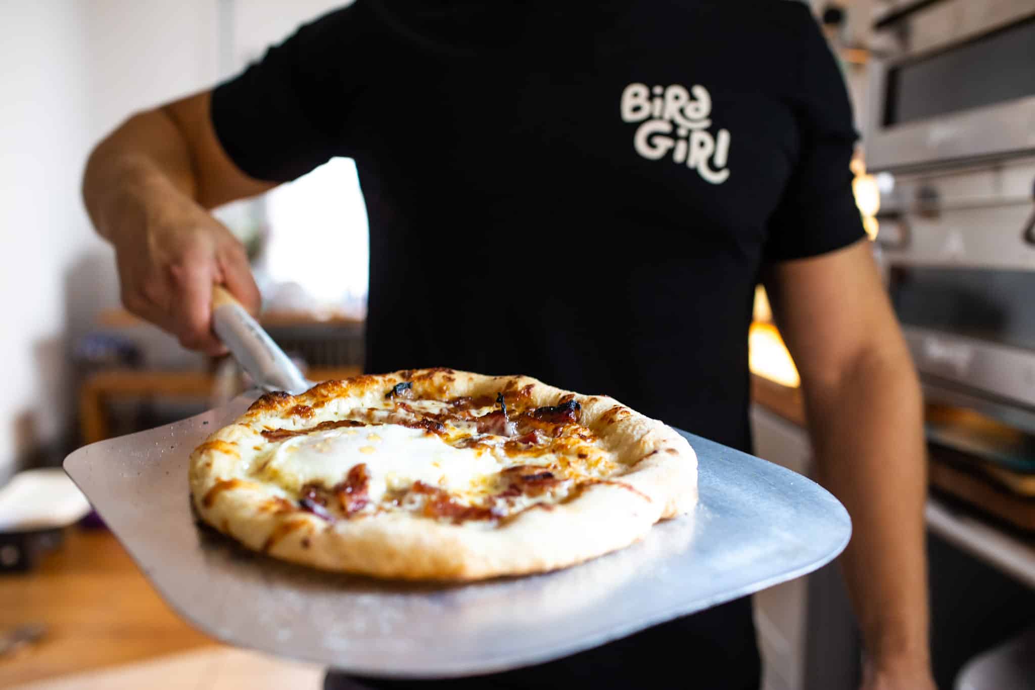 Bird girl bottle shop banner